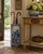 A classic blue and white porcelain umbrella stand in the chinoiserie tradition, featuring finely rendered birds among...