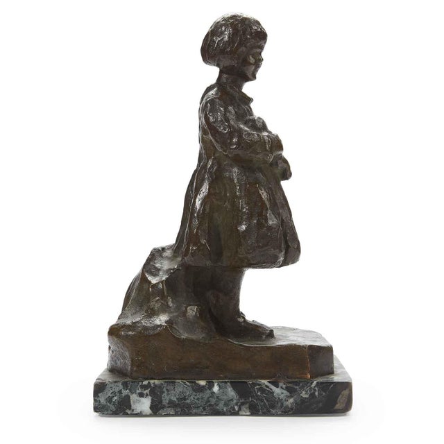 Renzo Zacchetti, Little Girl with Doll. Antique bronze sculpture from the Fascist era, circa 1938, depicting a little girl...