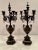 French pair of antique bronze neoclassical ornate candelabra having rouge and black marble two tone bases, decorative...