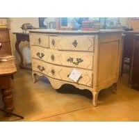 This 19th-century French commode is a stunning example of the Louis XV style, featuring a graceful serpentine front and...