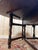 A gateleg drop-leaf table in solid oak, stamped Thos Turner, Manchester, an English manufacturer active in the late 19th...