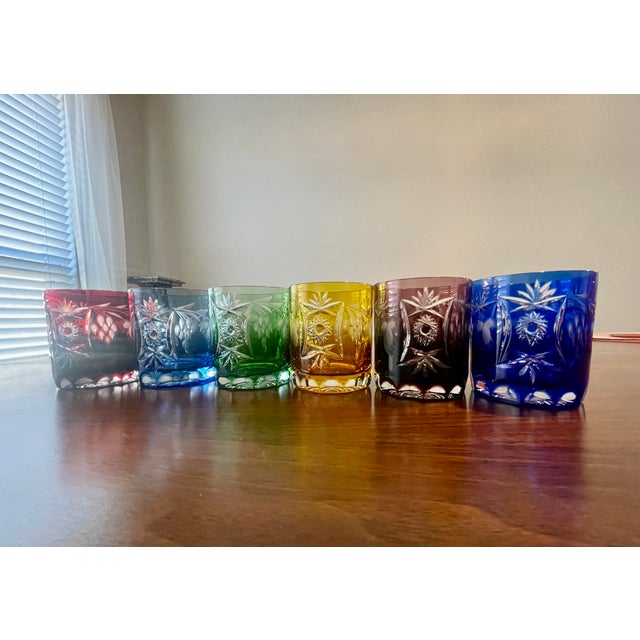 Elevate your barware with this exquisite set of Nachtmann crystal cocktail cups. Each featuring an elegant embossed grape...