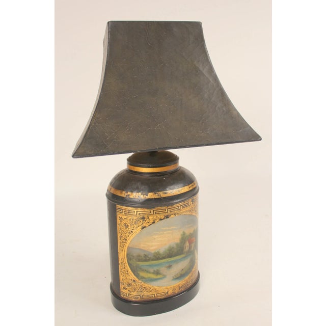 Antique painted and gilt decorated oval shaped tole tea canister lamp, late 19th century. The tole lamp base was either...