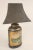 Antique painted and gilt decorated oval shaped tole tea canister lamp, late 19th century. The tole lamp base was either...