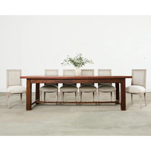 Exquisite set of six Swedish painted dining chairs crafted in the Gustavian Louis XVI taste. The chairs feature a...