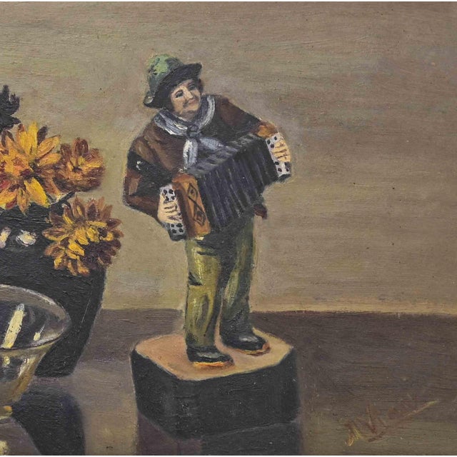 Still life with accordion player is an artwork realized by an italian artist of the mid-20th Century. Oil on panel, 38 x...