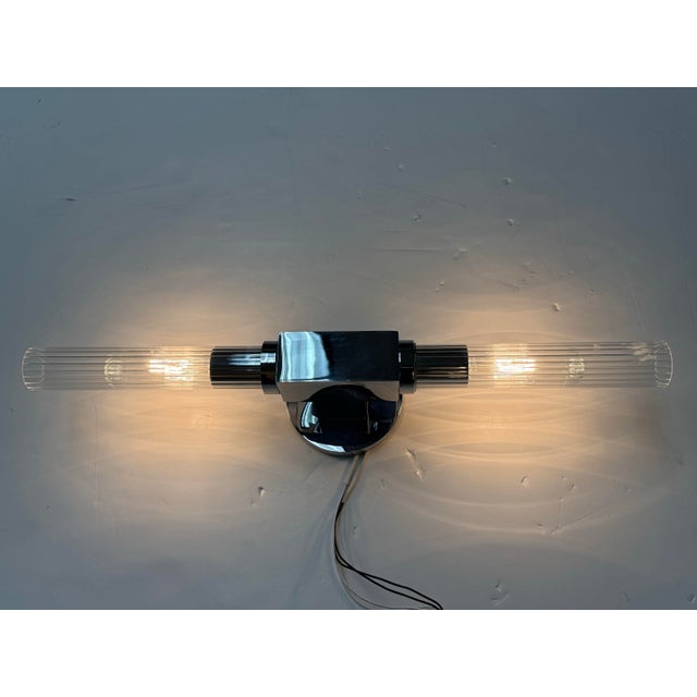 Design Plus Gallery presents a Cannele Linear Sconces by Jonathan Browning for Restoration Hardware. The shape is defined...