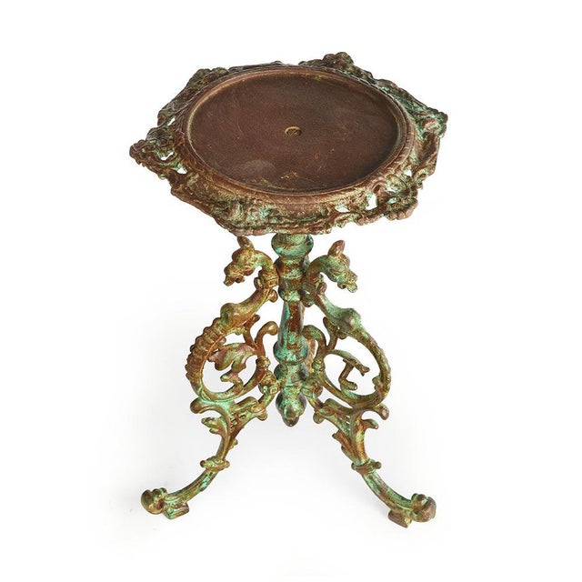 Bolster in cast iron with patina. This piece is designed in the style of the selected designer and/or manufacturer