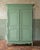 Elegant Soft Green Painted French Marriage Armoire from the 19th Century. Presenting a French Louis XV style painted...