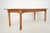 Reclaimed Farmhouse style dining room table made of medium stained oak. The table features thick, elegant baluster turned...