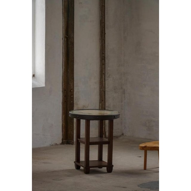 This elegant vintage side table is a classic jugendstil table, dating from the 1920s–1930s. The table reflects the refined...