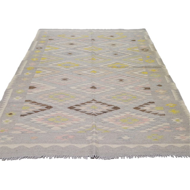 Flatweave with care using traditional rug making techniques, this wool rug blends timeless craftsmanship with a modern...