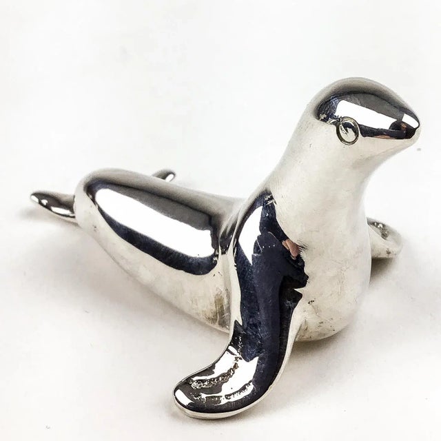 Adorable Seal Figurine silver plated spoon rest or chopstick rest. In as new condition so gift worthy indeed. Use as a...