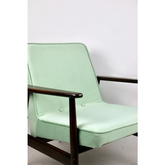 Vintage armchair in velvet fabric - GFM63 Lounge Chair design by J.Kedziorek - Reupholstered in light green - The product...