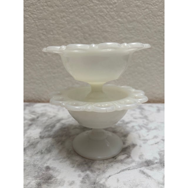 Vintage mid-century, white glass petite pedestal bowls with scallop decorative edges. Sweet and elegant for serving or use...