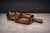 Carved from a single block of richly figured hardwood, this sculptural serving platter evokes the organic contour of a...