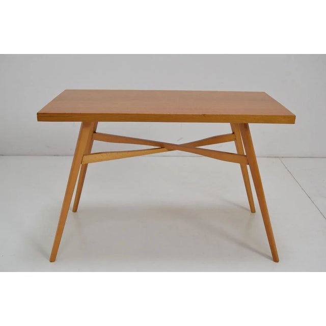 Made in Czechoslovakia Made of wood oak Original condition. This piece is attributed to the mentioned designer/maker. It...