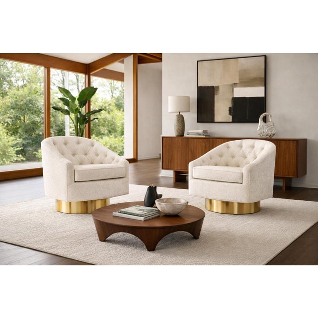 A true statement in form and function, this pair of mid-century swivel lounge chairs, attributed to Milo Baughman,...