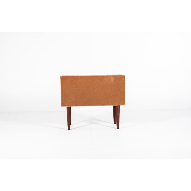 This elegant chest of drawers was made in Denmark in the 1960s. It has three generous drawers with beautifully shaped...