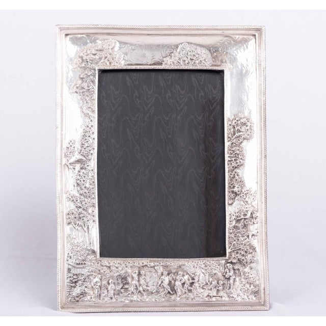 A large and weighty Sterling Pastoral / American Impressionism period (turn of the 20th century) standing photo frame...
