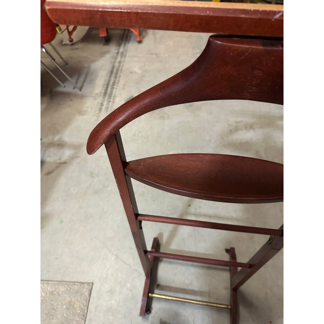 Up for consideration is a beautiful vintage wooden valet on wheels. This would look lovely in your home, and it is the...
