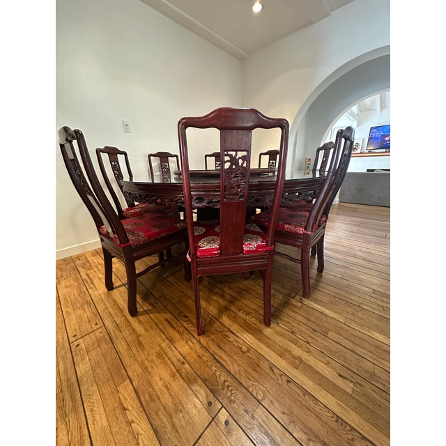 Created from solid rosewood, this dragon oriental dining set is a perfect addition for your dining room. The carvings are...