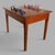 A characterful vintage French oak games table with an integrated chessboard and useful storage drawer. Its versatile...