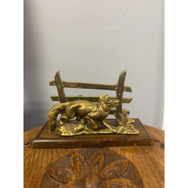 A delightful vintage English brass and wood letter rack, full of charm and character. The foreground and front stay are...