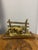 A delightful vintage English brass and wood letter rack, full of charm and character. The foreground and front stay are...