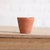 A charming 20th Century Petite Italian Terracotta Pot, hand-formed in warm, earthy terracotta with a beautifully timeworn...