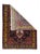 The particularly bold ecru medallion features four internal palmettes and four pointed finials. The red ground is centred...