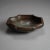 An antique Chinese low bowl offers bronze construction with stylized corner elements, signed on base as photographed,...