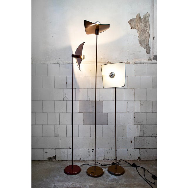 Set of three floor lamps with lacquered metal frames. Various heights. Manufacturer: Selenova 1970s 33x25x155 cm 33x25x185...