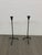 Design Plus Gallery presents a Pair of Black Iron Tripod Candlesticks. Each candlestick is formed in iron with a slender...