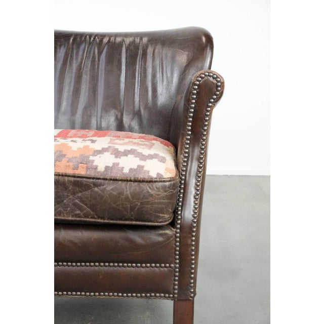Dark Brown Armchair in Cowhide with a Reversible Kelim Seat Cushion For Sale - Image 11 of 17