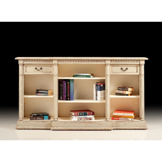 Marlborough bookcase. Solid walnut. Hand crafted in Italy. Finished on all sides. Carved molding. Four shelves. Two...