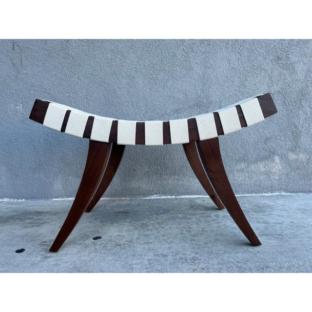 Adrian Ottoman designed by Dosbananos and made in Miami. Solid Walnut and Ivory Cotton Webbing. Ready for a new home.