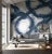 Alive with free-flowing movement and created outdoors by an expressive hand abstract markings twist and turn on a ground...
