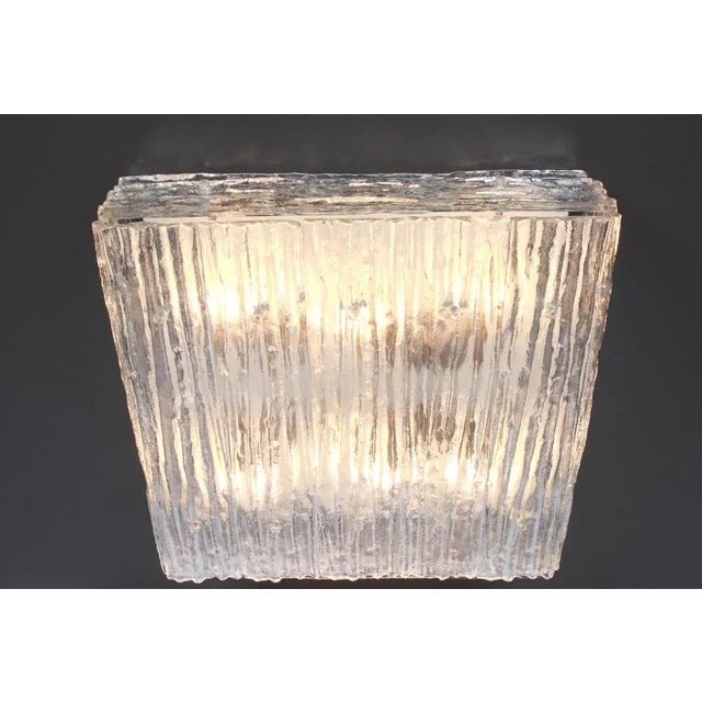 A stunning huge flushmount by kalmar, austria, manufactured in the 1960s. The flush mount is composed of a nine thick...