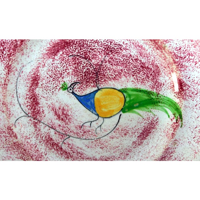 19th century red spongeware plate with peafowl decoration. A classic piece of American history!