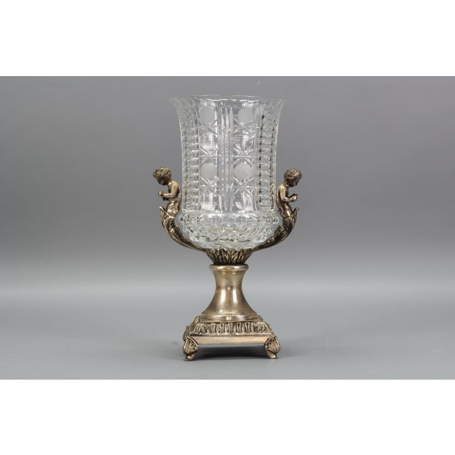 Czech crystal glass and brass vase with cherubs, ca. 1970s. This beautiful Victorian-style vase features a clear, cut...
