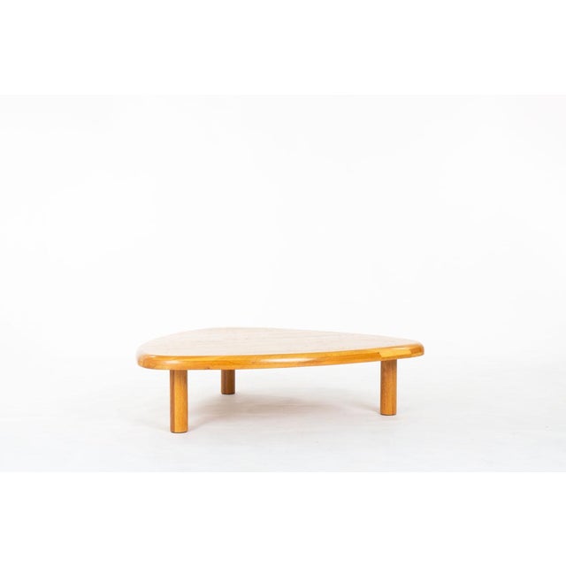 Coffee table from the fifties in France All in oak Top and 3 cylindrical feet Nice patina of the time