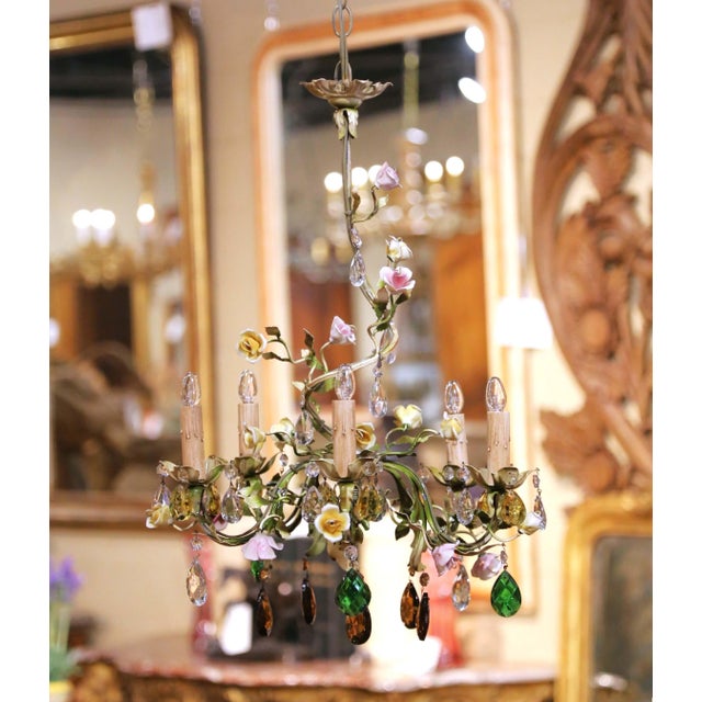 Decorate a powder room, hallway, bedroom, or small entry with this elegant antique floral chandelier. Crafted in France...