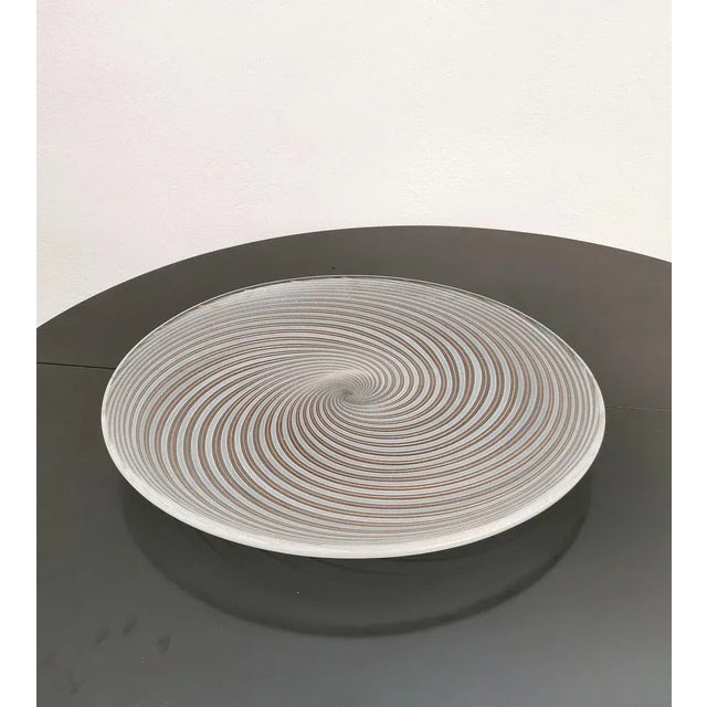 Large centerpiece/dish produced in the 70s' by the Italian window of Italian Salviati. The circular shape centerpiece was...