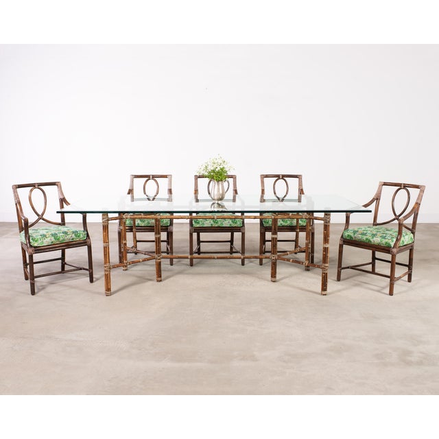 Elegant set of six rattan loop back dining armchairs made in the California coastal organic modern style by McGuire...