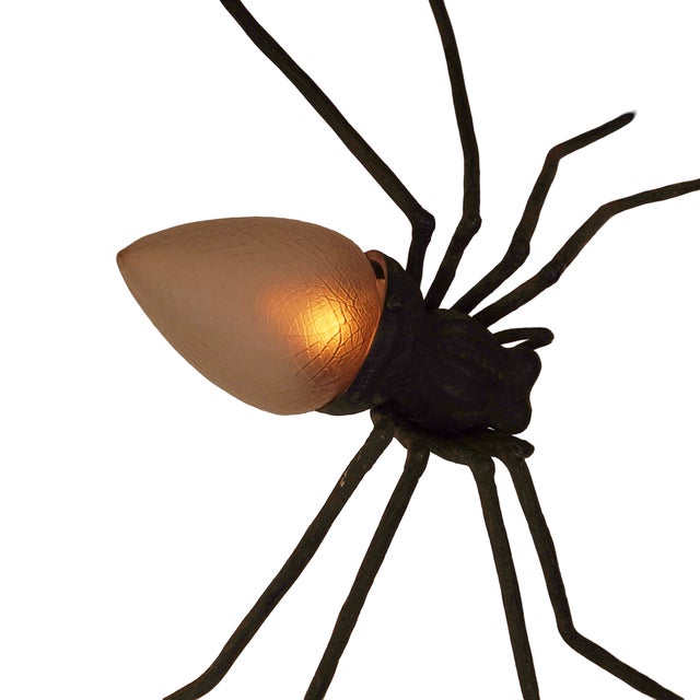 The Vintage Italian Handmade Iron & Copper Spider Sconce with Murano Glass exudes sculptural drama and artisanal finesse....