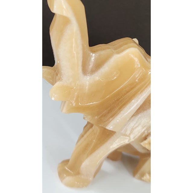 Pair of Vintage Hand-Carved Honey Onyx Elephant Figurines For Sale - Image 13 of 16