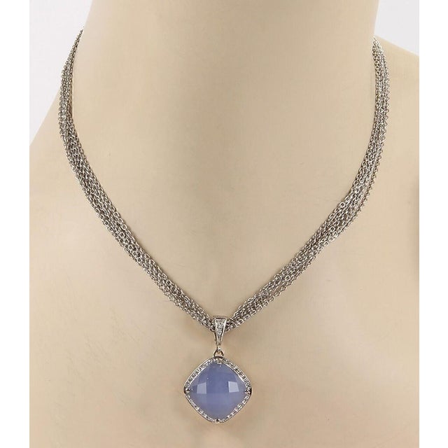 This authentic designer necklace by Rina Limor is finely crafted from 18k white gold with a polished finish. The pendant...