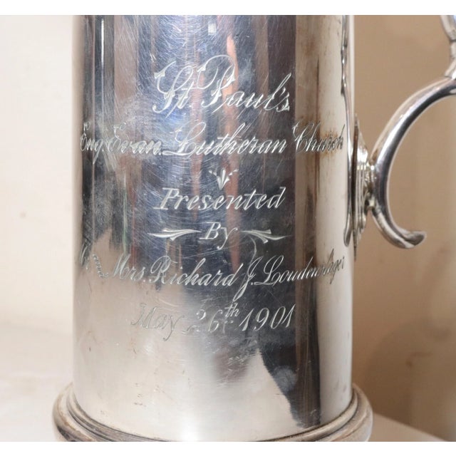 Up for sale is a high quality antique silver-plated religious wine claret made in 1901. This lovely presentation jug is...