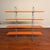 Vintage IKEA Enetri shelf, designed by Niels Gammelgaard, featuring bright orange shelves with a light grey frame. It's a...